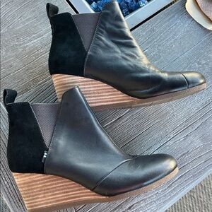 Toms Black pull on Ankle Booties with wedge wood grain heel.